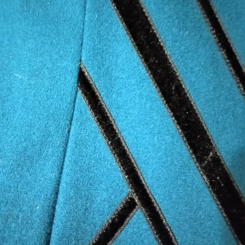 Fine Feathers size 8 women's 2-piece woolen suit. Gorgeous, one moth hole
